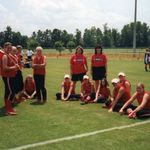 Lauren holds the Arkansas Flag as the team waits for the opening cermony at Nationals in Alabama - 2003