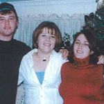 Josh, Katie, Amber and Brant posing for a Christmas Photo. 