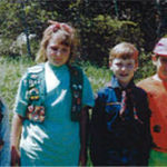 The Scouts- A Brownie, A Junior, A Cub Scout and a Tiger Cub 