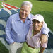 In this June 22, 2005, file photo, New England Patriots owner Robert Kraft and his wife Myra pose in front of a Patriots logo painted on their lawn in Brookline, Mass. Myra Kraft died Wednesday, July 20, 2011. 