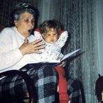 Grandma reading to her Gabrielita