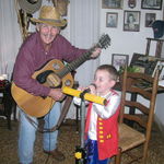 Lavern and Landen on Halloween night playing and singing.