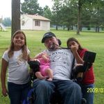 Monty with Kristen, Leeann, and Isabel in July of 09.