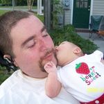 Isabel giving Uncle Monty kisses.
