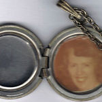 Cookie in Mom's locket. She's so young!