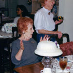 80th birthday. Yes, Cookie blew out the candles. NOTE: Her wine at the table - ha ha ha