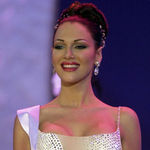 In this photo taken on Sept. 9, 2000, Eva Ekvall competes in the Miss Venezuela 2000 beauty contest in Caracas, Venezuela. Ekvall, whose struggle with breast cancer was closely followed by Venezuelans, has died at age 28. Her family said Ekvall died Saturday Dec. 17 at a hospital in Houston. Eva Ekvall