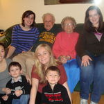 Mary with Jim with their granddaughters and great-grandsons.