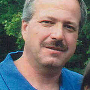 Paul E. COUTURE