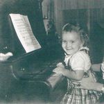Karen and Wannie playing the piano