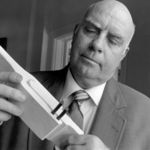 Engineer Roger Boisjoly examines a model of the O-Rings, used to bring the Space Shuttle into orbit, at a meeting of senior executives and academic representatives in Rye, New York, Sept. 1991. Boisjoly is donating his memos warning about the possibility of disater to Chapman University. Roger Boisjoly