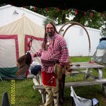danny pausing for a moment (in the rain too...bless him) so i could snap this pic of his regalia...gaston 2008