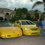 The 3 brothers; Chris, Danny and Michael. Next to Dan and Chris' supercharged yellow Chevys on Thanksgiving Day, 2011.