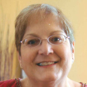 Corinne M Smith