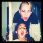 the best aunt a girl could ever ask for, blowing out candles while celebrating our march birthdays