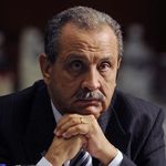  In this Saturday, Dec. 11, 2010 file photo, Shukri Ghanem, Chairman of Libya's National Oil Corporation, listens during the 158th extraordinary meeting of the Organization of the Petroleum Exporting Countries (OPEC) in Quito, Ecuador.