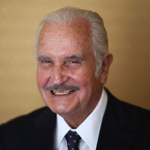 Mexican author Carlos Fuentes poses for a photo after a press conference in Mexico City, Monday March 12, 2012. Fuentes is a member of the jury for the literary award "Formentor de las Letras 2012," won this year by Spain's writer Juan Goytisolo. 