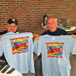 Tom showing of one of the great MGST tee shirts