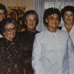 With her mom and sisters