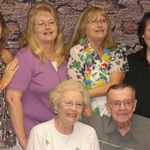 Debbie,Carol,Cathy & Tammy seated Kathy & Norm 80th Birthday Party