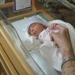 March 14, 2008
Audrey holding onto Pa's finger with her tiny hand,