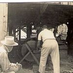 Uncle Allen Milliken WW1 vet ,Gill Peterson,back to camera  George is on other side of Saw . Mother took most of these pictures w/her trusty Box Brownie