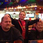 The boys at Hooters getting some chicken wings