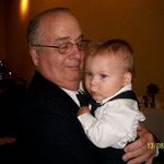 holding his grandson Van at Brian & Lani's wedding