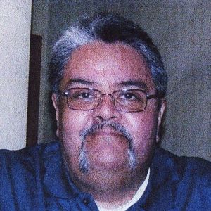 Mario L. De Alba