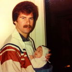 Jim carrying Baby daughter Michelle