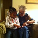 Camdyn reading to Grand-Nan