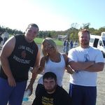 This photo is of Kyle Walsh, Anthony Walsh, and Jake Murphy after a big football win at Bluffon University with Allison Walsh, their loyal fan!