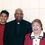 Michael, Fr. Howard, and Marina