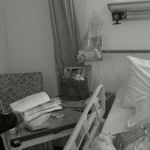 Dad w/ Fr. Rodel at his hospital bedside reading him a Scripture...