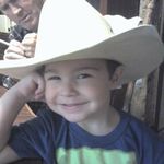 Aaron always loved to wear Johnny Bones' cowboy hat!  Johnny touched our hearts and lives and will be missed dearly! Aaron loved him very much!