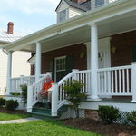 Job well done. Bill on the porch of Grandma Lee's renovated house.