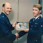 Chris accepting his award for Airman of the Quarter, United States Air Force