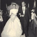 Larry and Carolyn Brink, walking down the aisle on November 2, 1957.