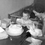 Helen, John and Ann Louise blowing out birthday candles in 1963