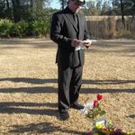 Tony (son) saying a few words over dad's grave.