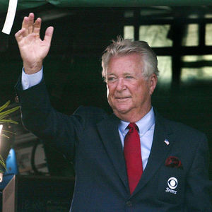This June 2, 2011 file photo shows retiring CBS golf broadcaster Ken Venturi waves to Kemper Open winner Bob Estes from the broadcast booth during the final round of the Kemper Open at the TPC at Avenel in Potomac, Md. The former U.S. Open champion has died just 12 days after he was inducted into the World Golf Hall of Fame. He was 82. His son, Matt Venturi, says he died Friday May 17, 2013 in a hospital in Rancho Mirage, Calif. Venturi had been hospitalized the last two months for a spinal infection, pneumonia and an intestinal infection.