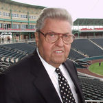 In a March 30, 2004 file photo, John Q. Hammons poses for a photo in his new 8,000 seat baseball stadium in Springfield, Mo. Hammons, a prominent hotel developer and southwest Missouri philanthropist, died Sunday, May 26, 2013 at a nursing home in Springfield, Mo., said Sheri Davidson Smith, a spokeswoman for John Q. Hammons Hotels & Resorts. He was 94. John Q. Hammons