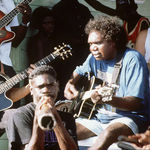 FILE - In this Jan. 1, 2013 file photo, Mandawuy Yunupingu, right, plays with Peter Maffay and a didgeridoo-player. World-renowned musician Mandawuy Yunupingu, the former lead singer of Australian indigenous band Yothu Yindi and one of the country's most famous Aborigines, died Sunday night June 2, 2013, at his home in a tiny Outback Aboriginal settlement in the Northern Territory. He was 56. Mandawuy Yunupingu