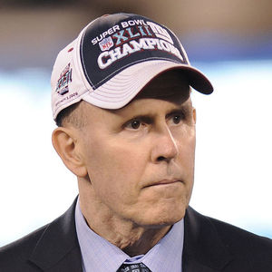This is a Dec. 4, 2011 file photo showing former New York Giants player Dave Jennings being honored during a halftime ceremony of an NFL football game between the Giants and the Green Bay Packers in East Rutherford, N.J. Former Giants punter and radio analyst Jennings has died. He was 61. The Giants announced that Jennings died at his home in Upper Saddle River, N.J., on Wednesday morning, June 19, 2013.
