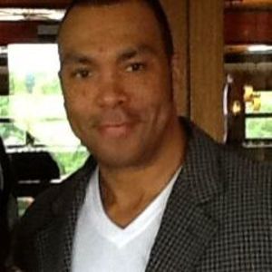 Dr. Lawrence E. Holcomb