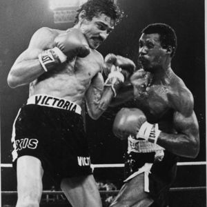 In this Jan. 28, 1978 file photo, Nicaragua's junior lightweight fighter Alexis Arguello, left, cuts into Puerto Ricos' Alfredo Escalera with a strong left in the ninth round of their World Boxing Council title fight near San Juan.