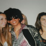 Ya...that's Adrian in the afro! I think this was for a homecoming dance. We all dressed in 70's gear. I have better photos of him, just need to find them. He was so much fun & just a wonderful person. Heart of gold!