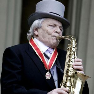 Sir John Dankworth plays his saxophone at Buckingham Palace, London, Thursday, March 2, 2006, after receiving a knighthood from the Britain's Queen Elizabeth II. 