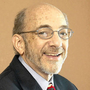Dr. Burton Grebin is pictured in this photograph.  Grebin died January 24th at the age of 68.