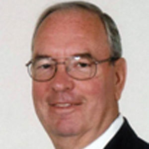 THOMAS J. STRASSER